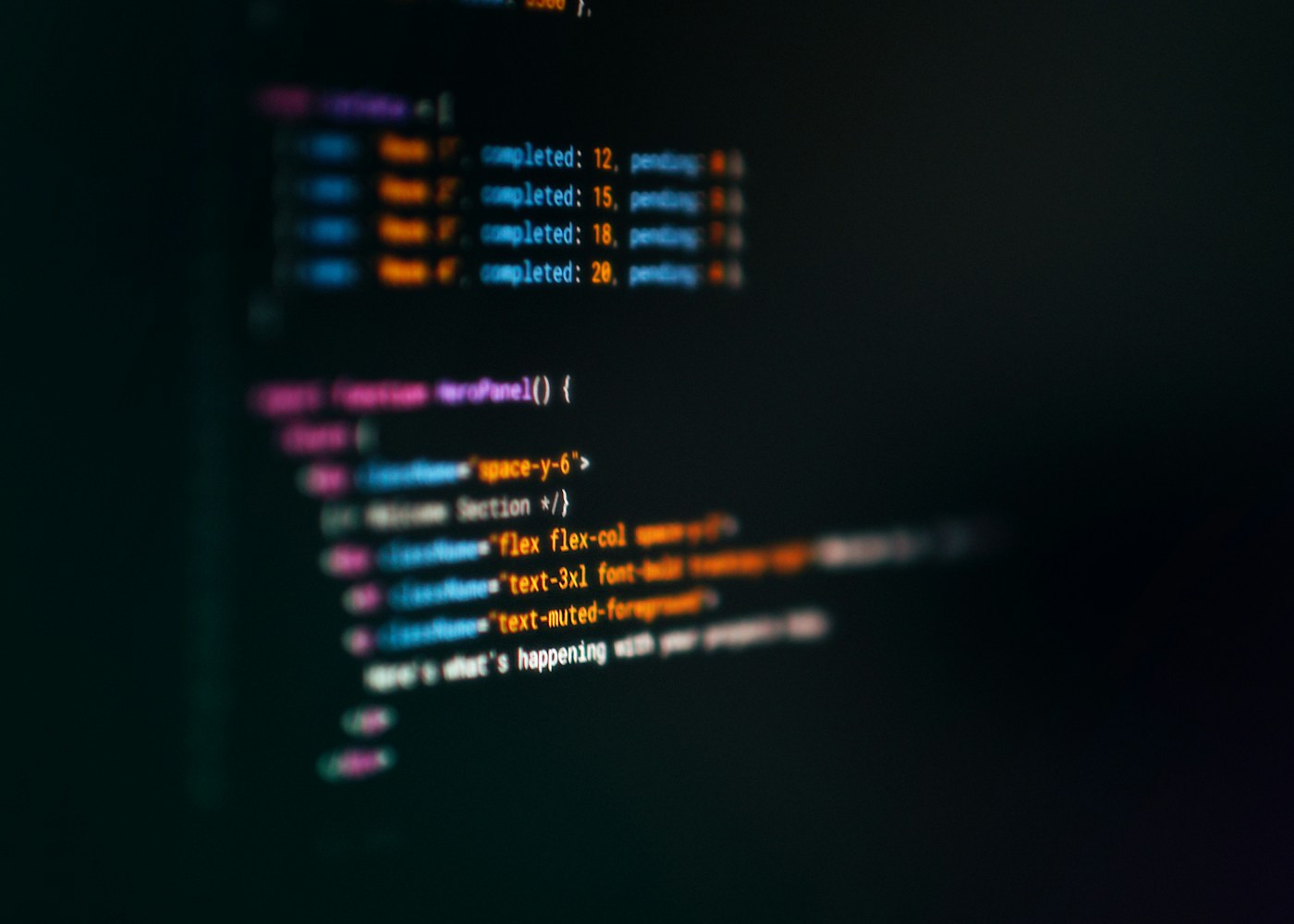 Close-up of syntax-highlighted source code on a dark screen